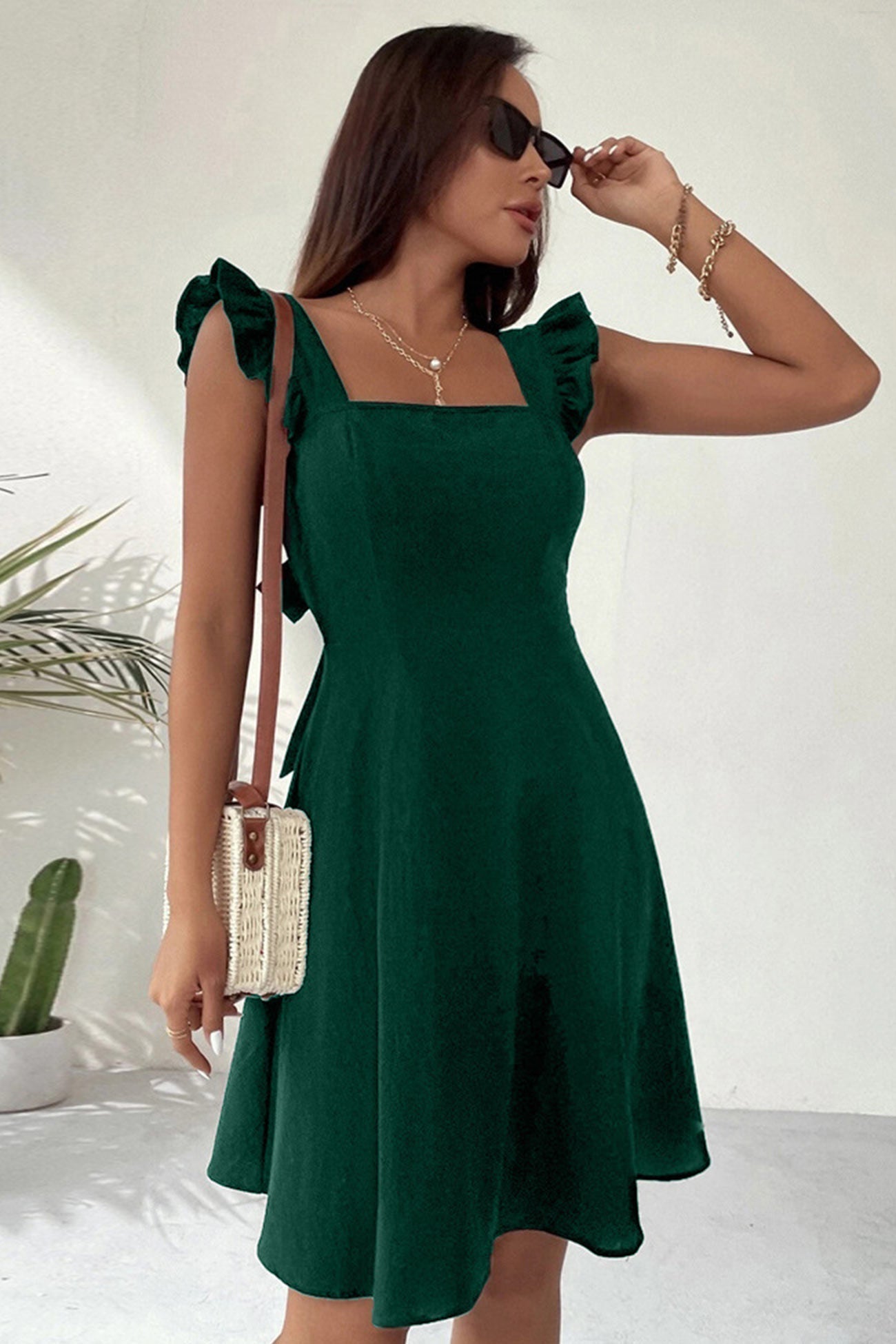Vestido Mini Sin Mangas con Cuello Cuadrado y Detalle de Lazo en la Espalda – Ideal para el Verano