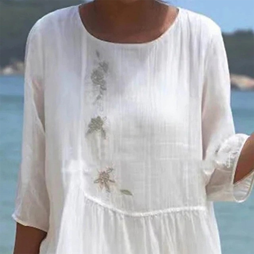 Vestido midi blanco ligero con corte sin mangas y dobladillo flare | Ideal para verano