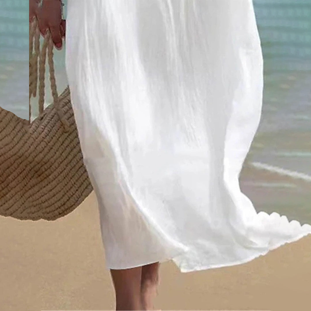 Vestido midi blanco ligero con corte sin mangas y dobladillo flare | Ideal para verano