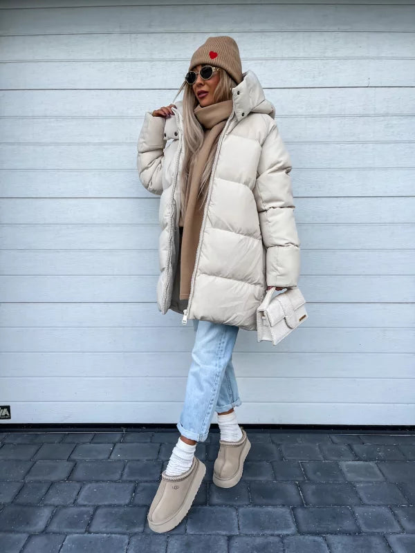ChatGPT said: Abrigo acolchado impermeable con capucha y cierre de cremallera completa I Ideal para invierno