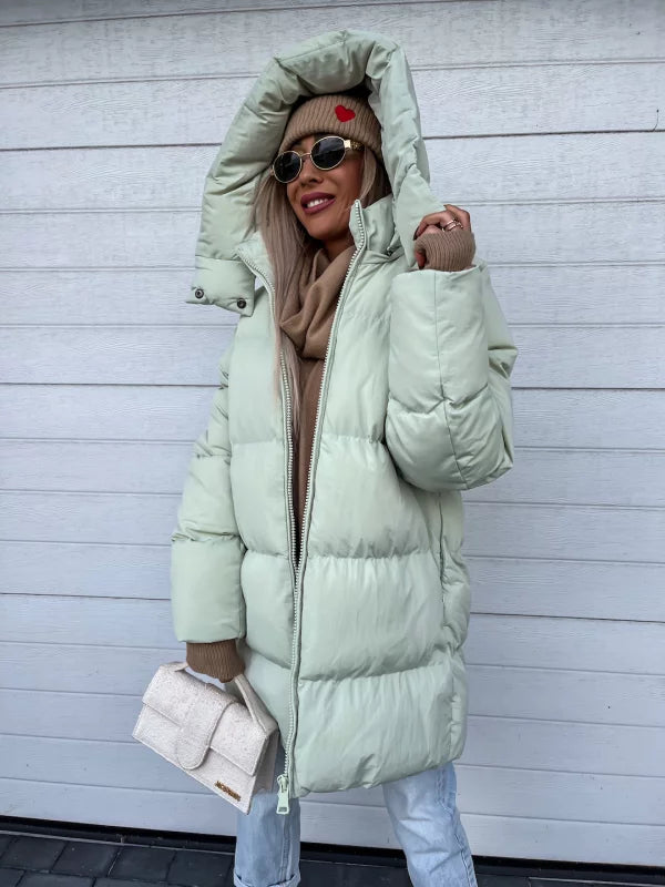 ChatGPT said: Abrigo acolchado impermeable con capucha y cierre de cremallera completa I Ideal para invierno