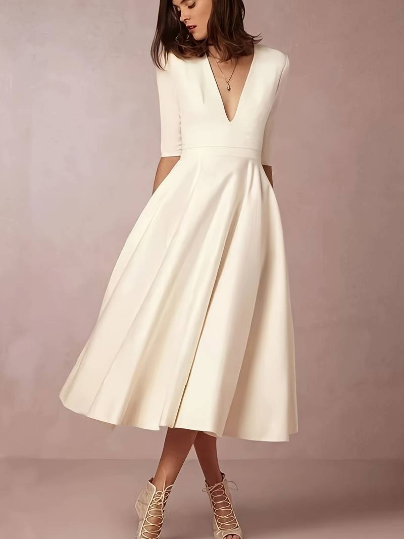 Vestido Holgado con Escote en V y Tejido Ligero | Silueta Fluida – Ideal para el Verano