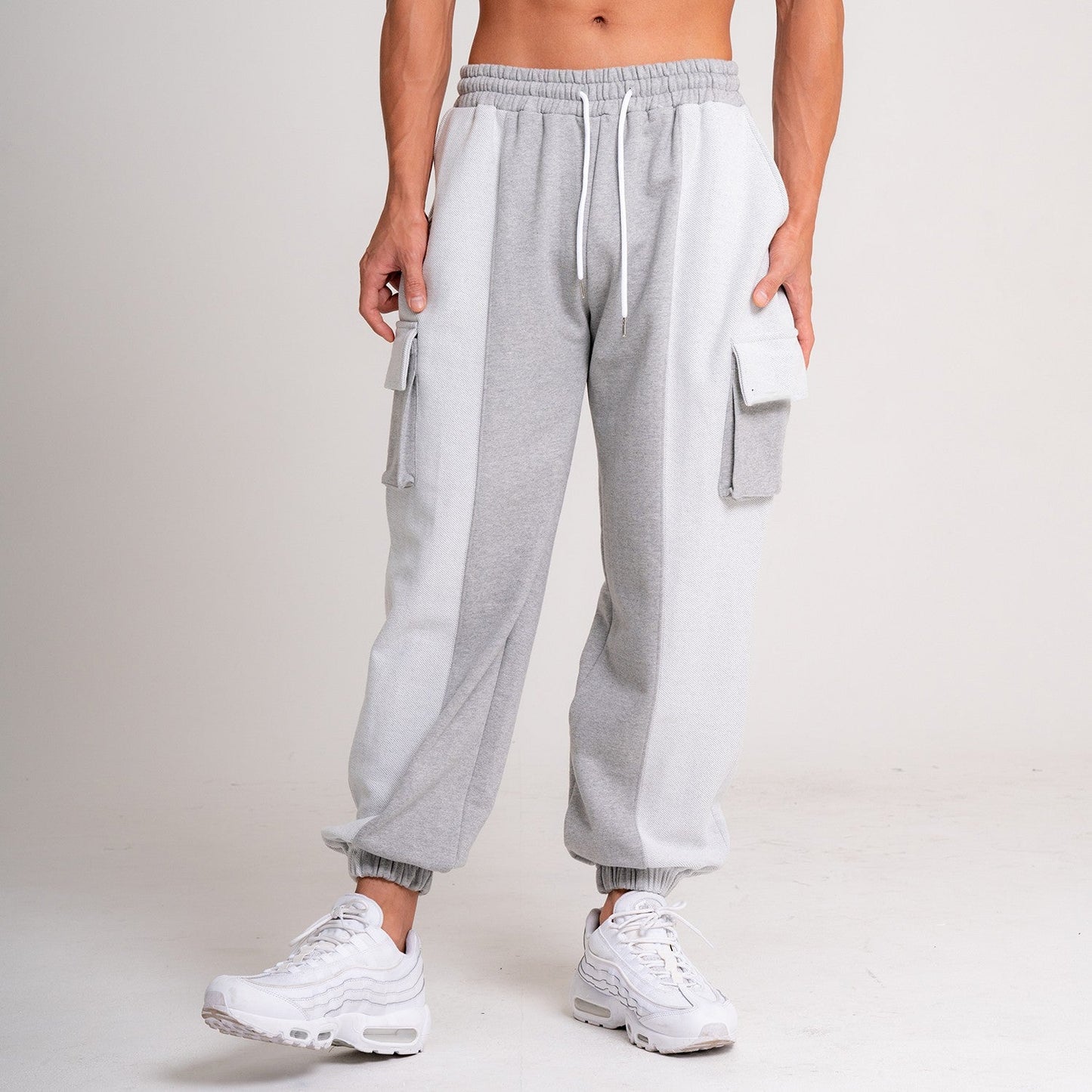 Pantalones Holgados con Múltiples Bolsillos y Cordón para Hombre – Ideales para Otoño e Invierno