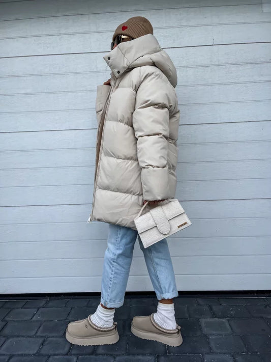 ChatGPT said: Abrigo acolchado impermeable con capucha y cierre de cremallera completa I Ideal para invierno